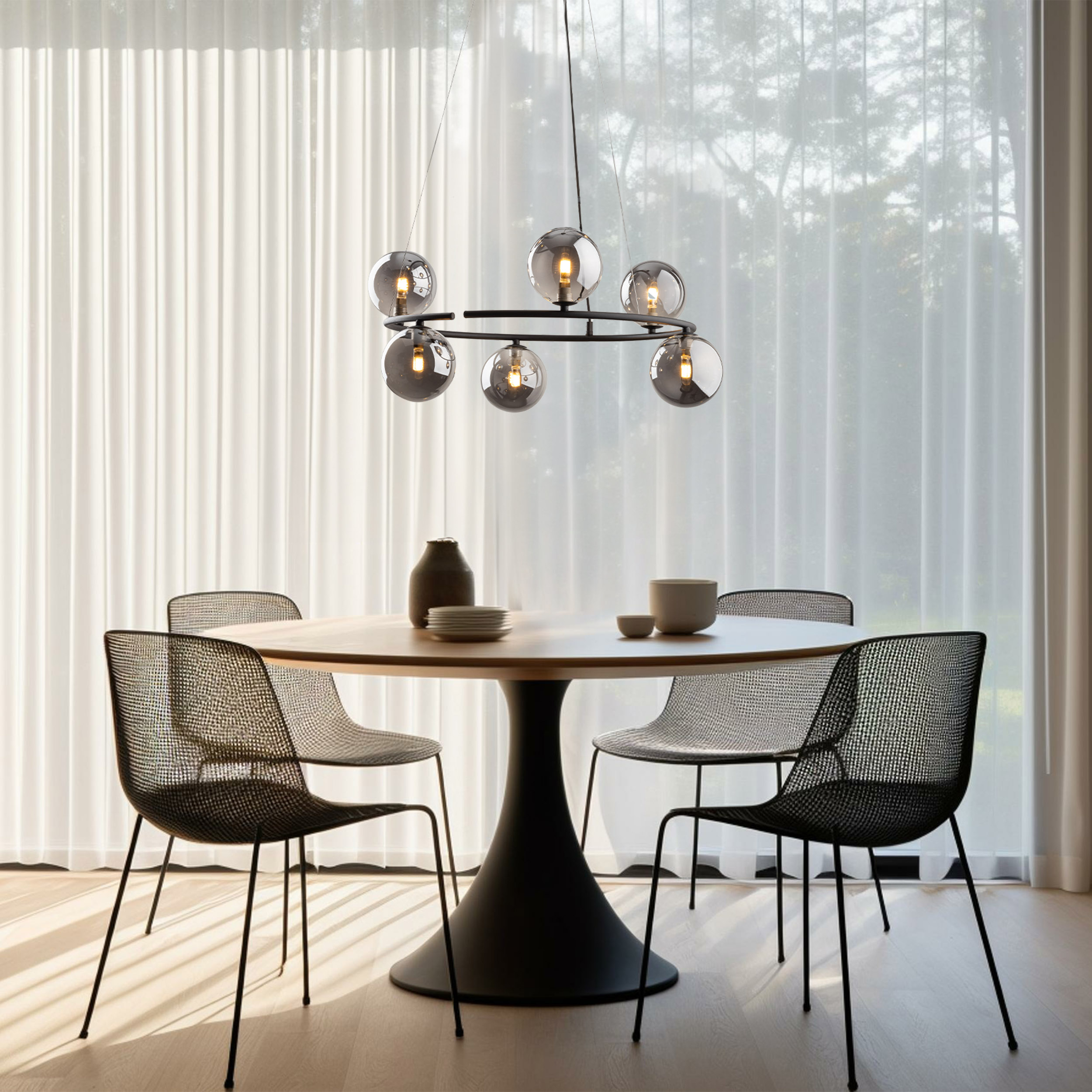 Minimalist dining room with round table, chairs, hanging light,